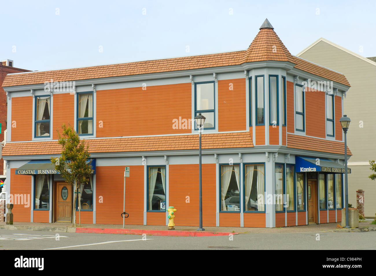 view of typical Victorian style orange store in Arcata, California, USA Stock Photo