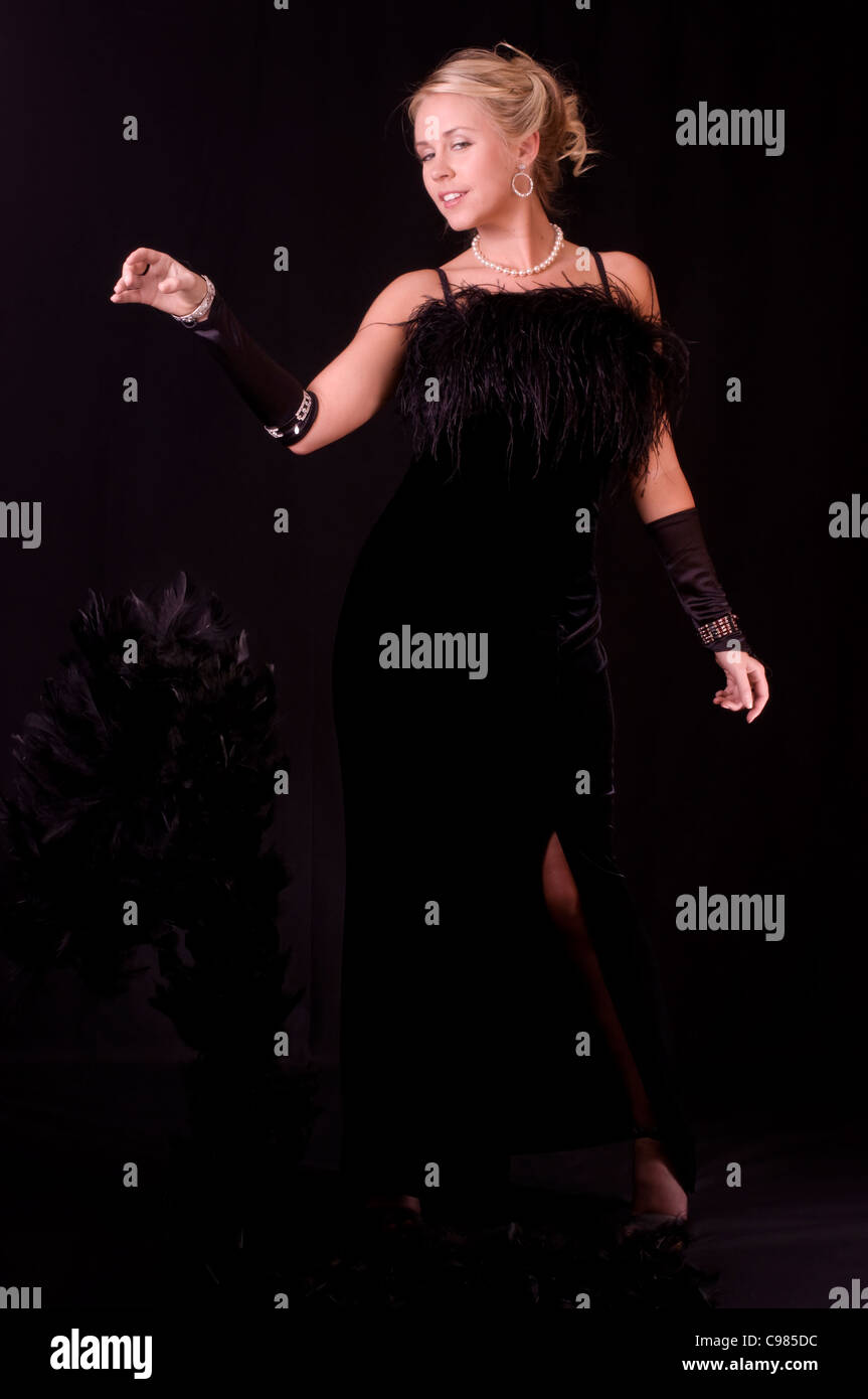 Sensual Striptease from Black Evening Gown to Nothing Stock Photo - Alamy