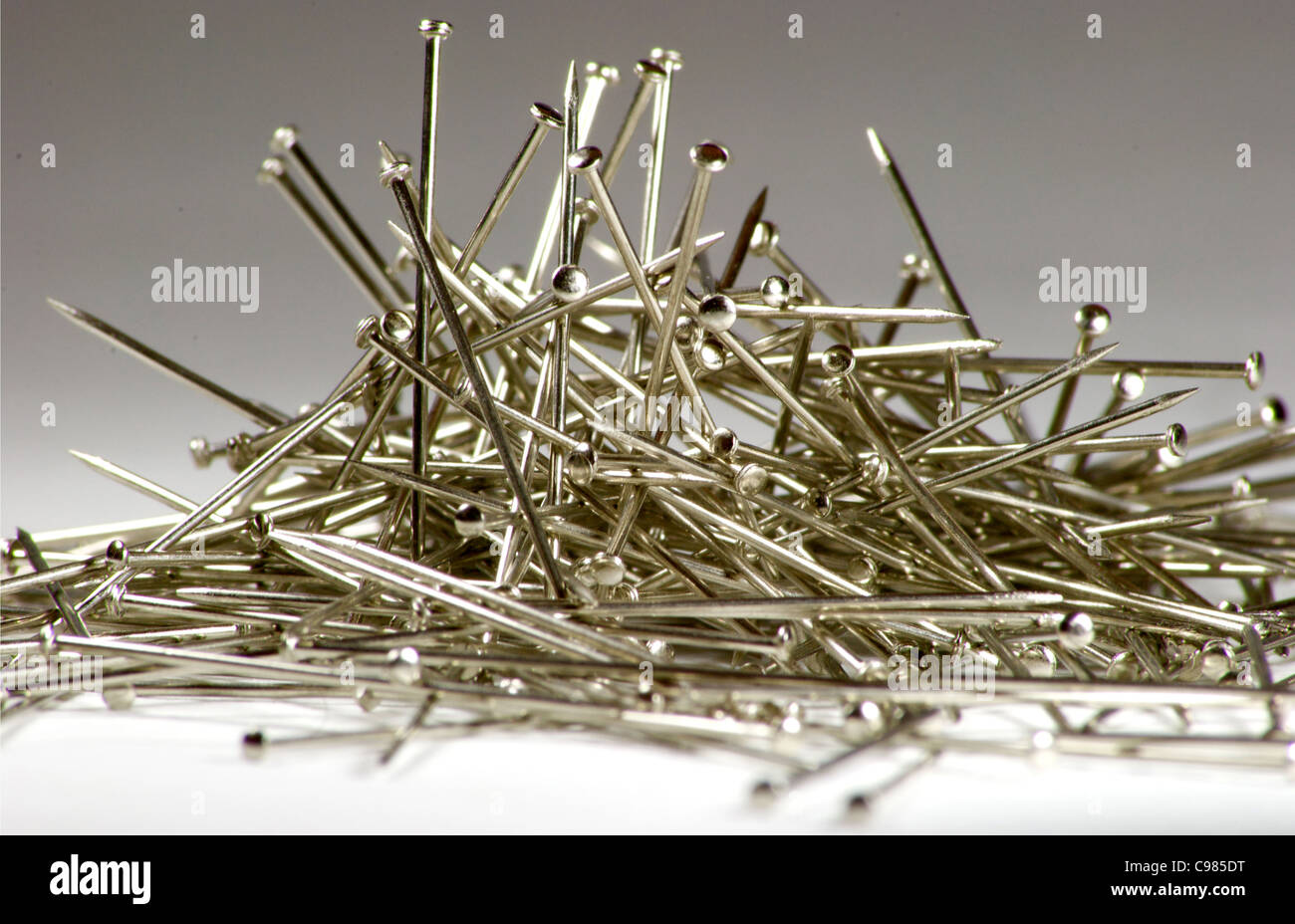 A selection of randomly dropped pins Stock Photo Alamy