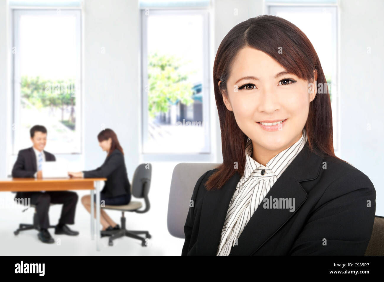 Pretty chinese woman china office hi-res stock photography and images -  Alamy