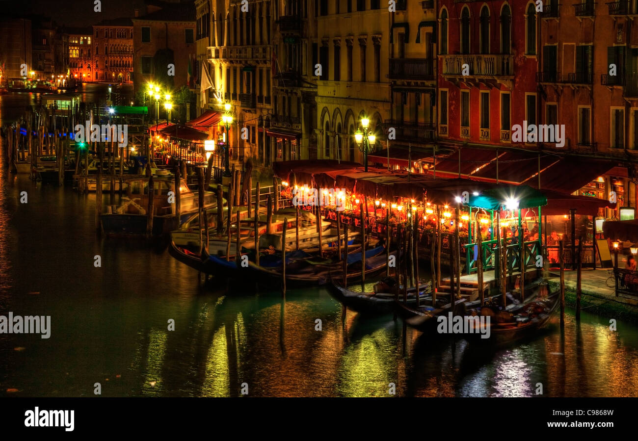 Night image in Venice on the Grand Canal in the vicinity of the Rialto Bridge. Stock Photo