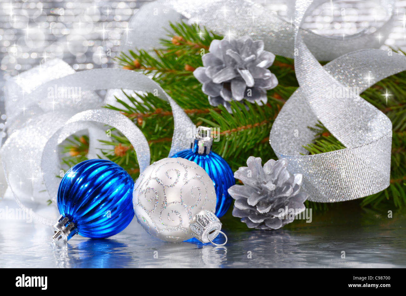 Blue and silver Christmas balls over bright background Stock Photo - Alamy