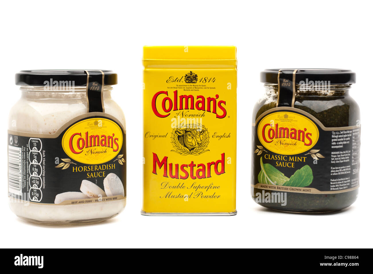 Three Colmans products mustard powder tin mint sauce and horseradish sauce Stock Photo