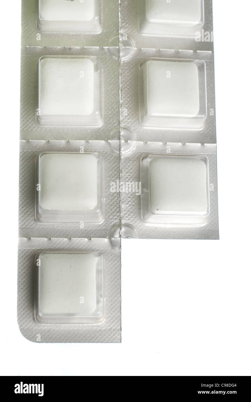 Packet of nicotine gum with piece missing isolated on white Stock Photo