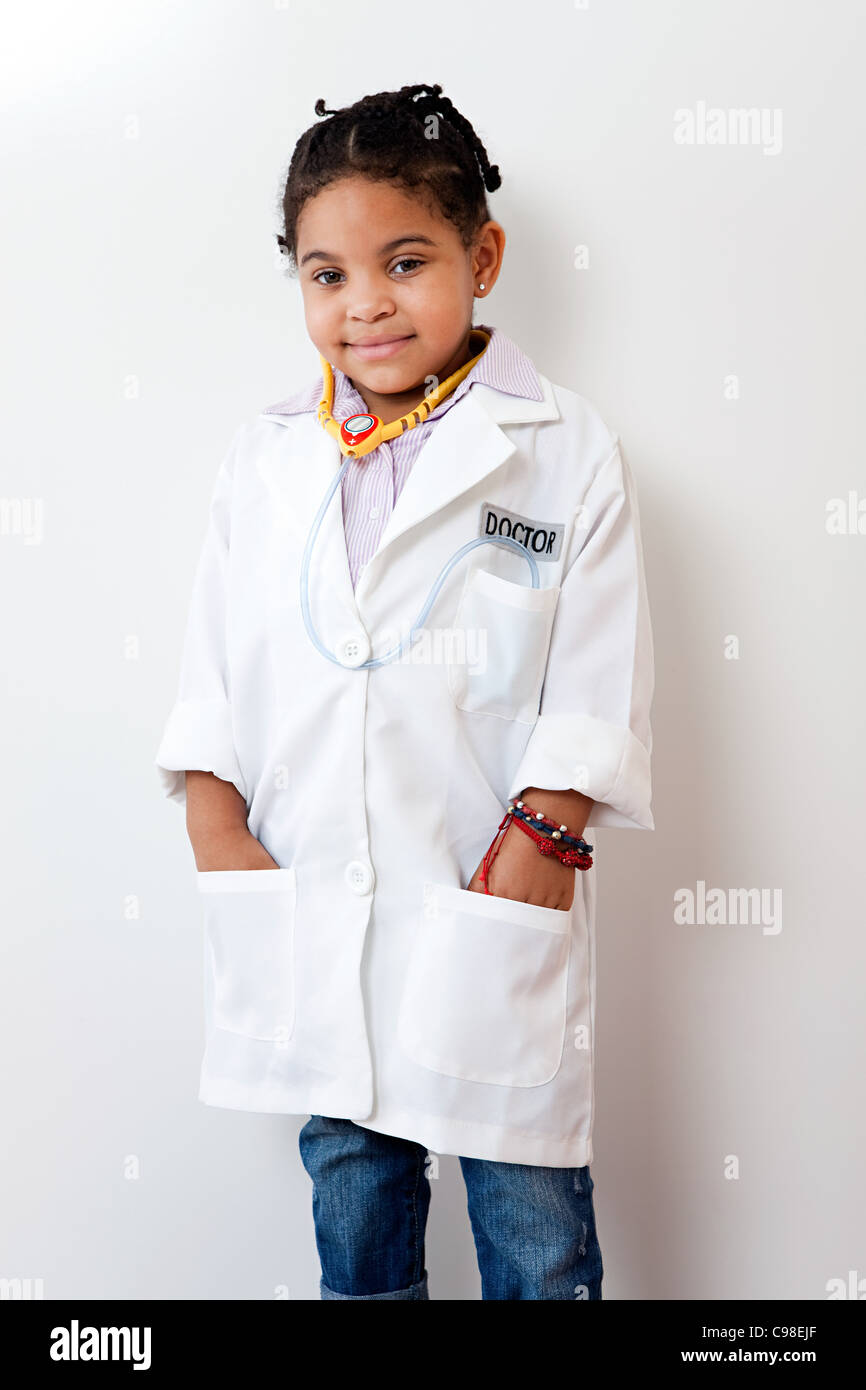 Girl dressing up as doctor Stock Photo Alamy
