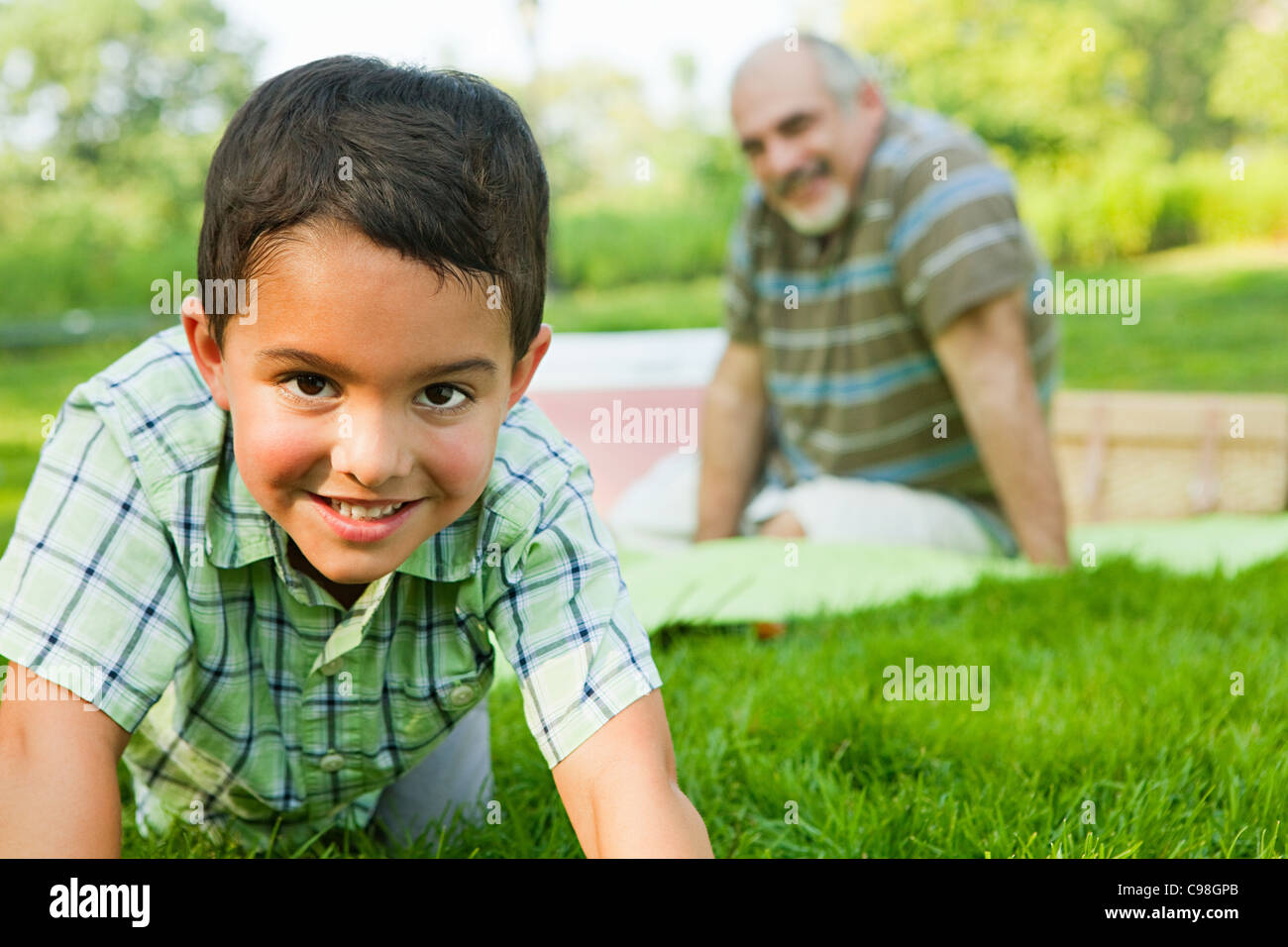 Grandson smiling park, portrait Stock Photo