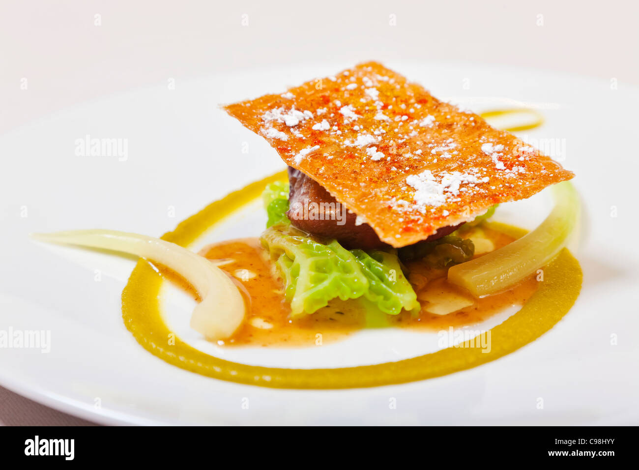 Recipe with young pigeon, pastilla and cabbage., Restaurant Sa Qua Na 22, pl. Hamelin Honfleur (14600) France TÉL : +33 2 31 8 Stock Photo