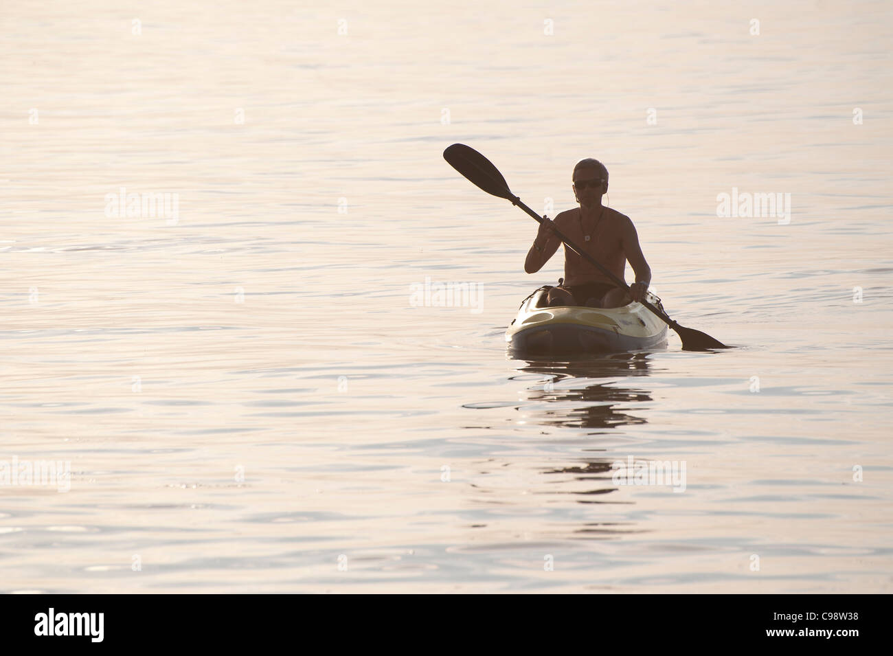 man in a canoe Stock Photo - Alamy
