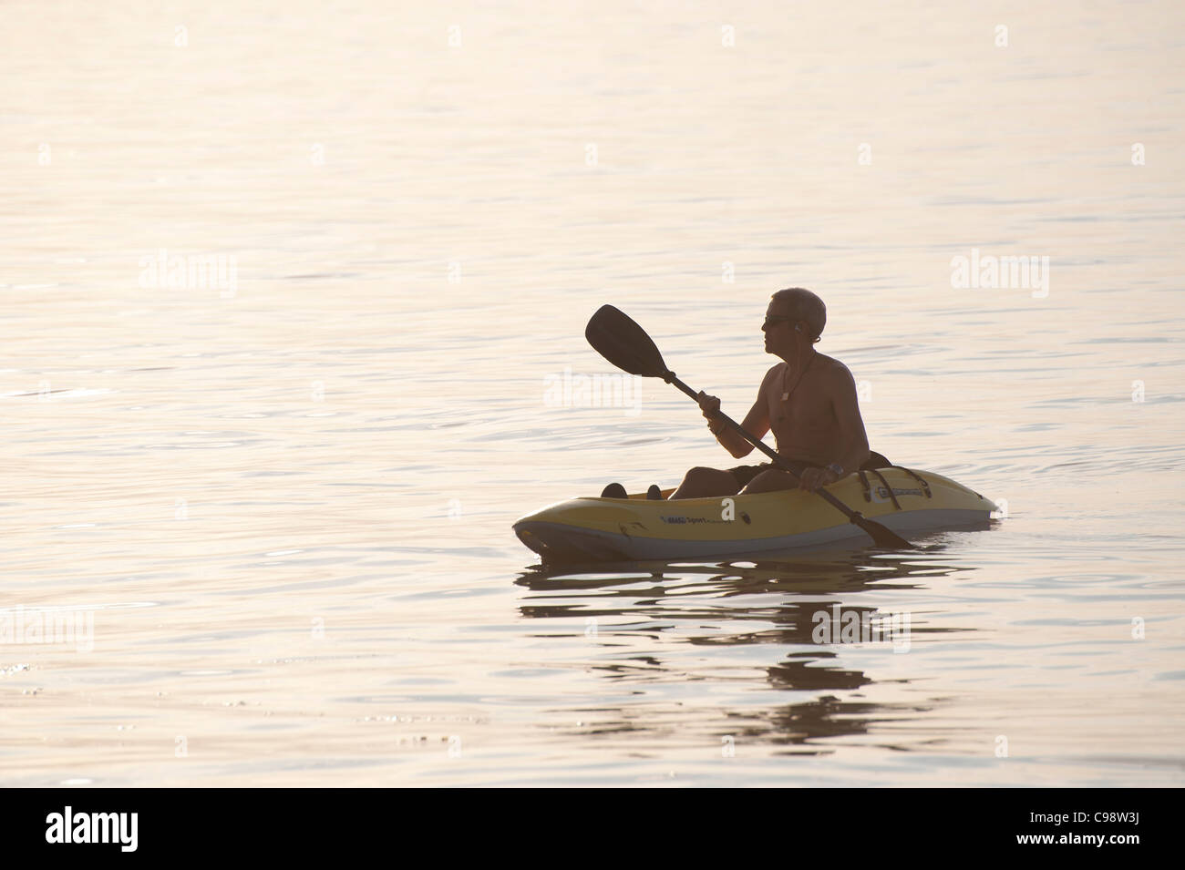 man in a canoe Stock Photo - Alamy