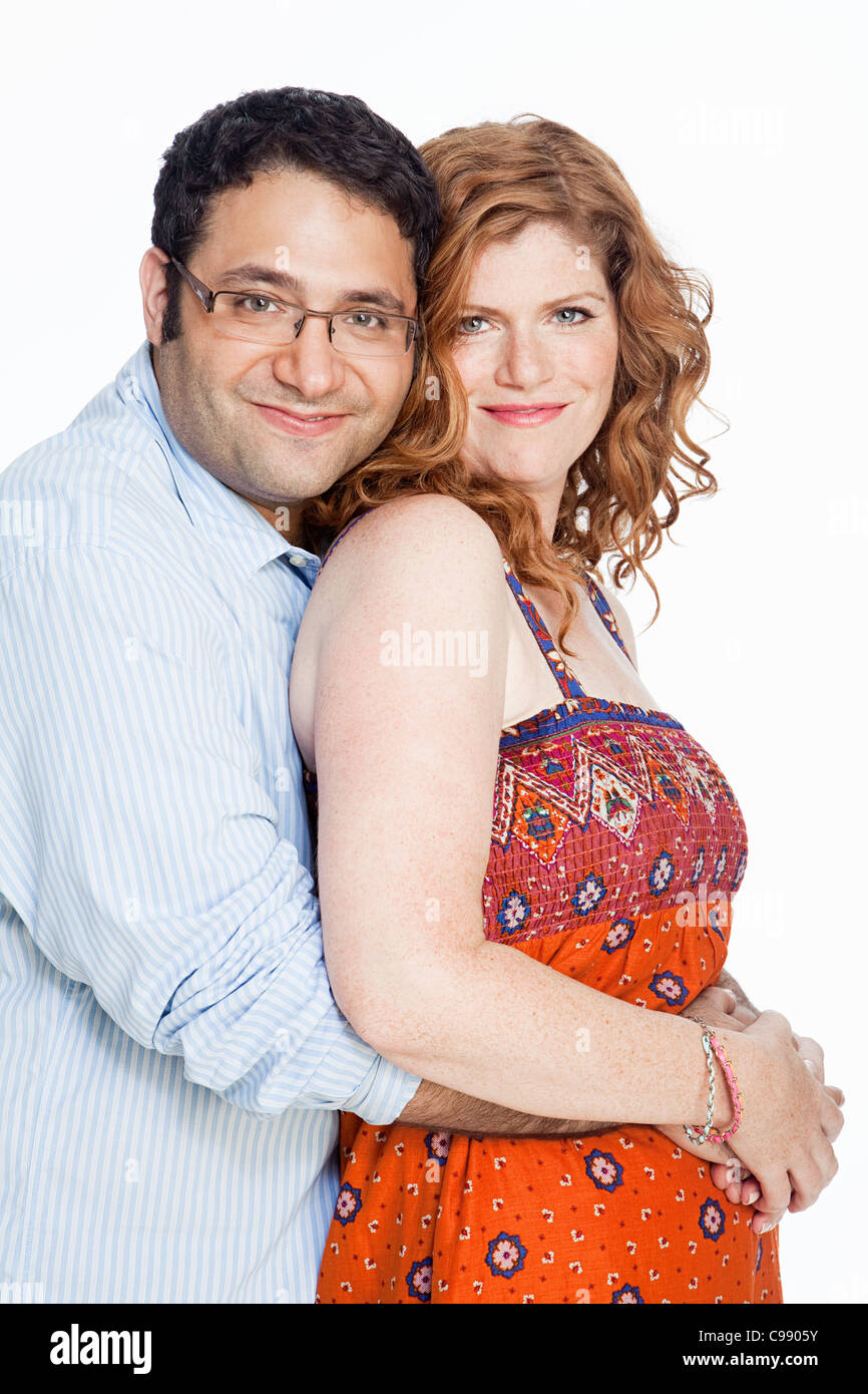 Portrait of couple against white background Stock Photo