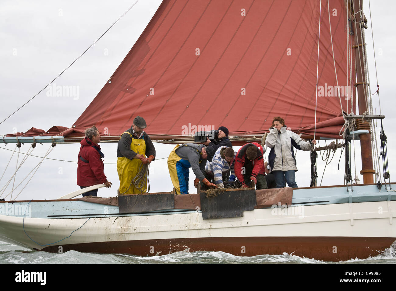 Television  film crew at sea. Stock Photo