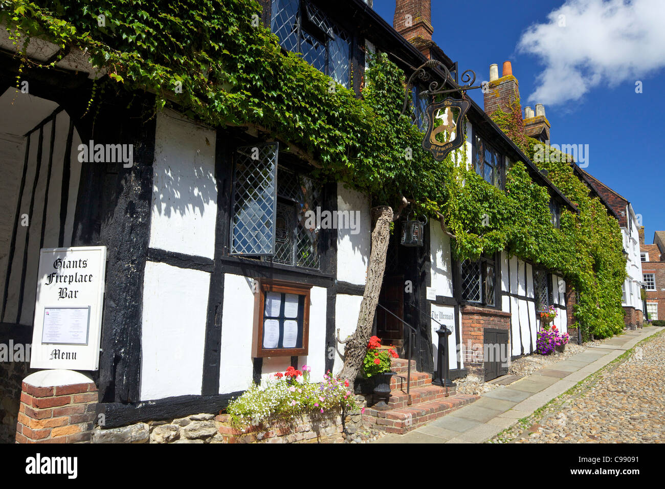 The Mermaid Inn, Mermaid Street in summer sunshine, Rye, East Sussex, England, UK, United Kingdom, GB, Great Britain, Stock Photo