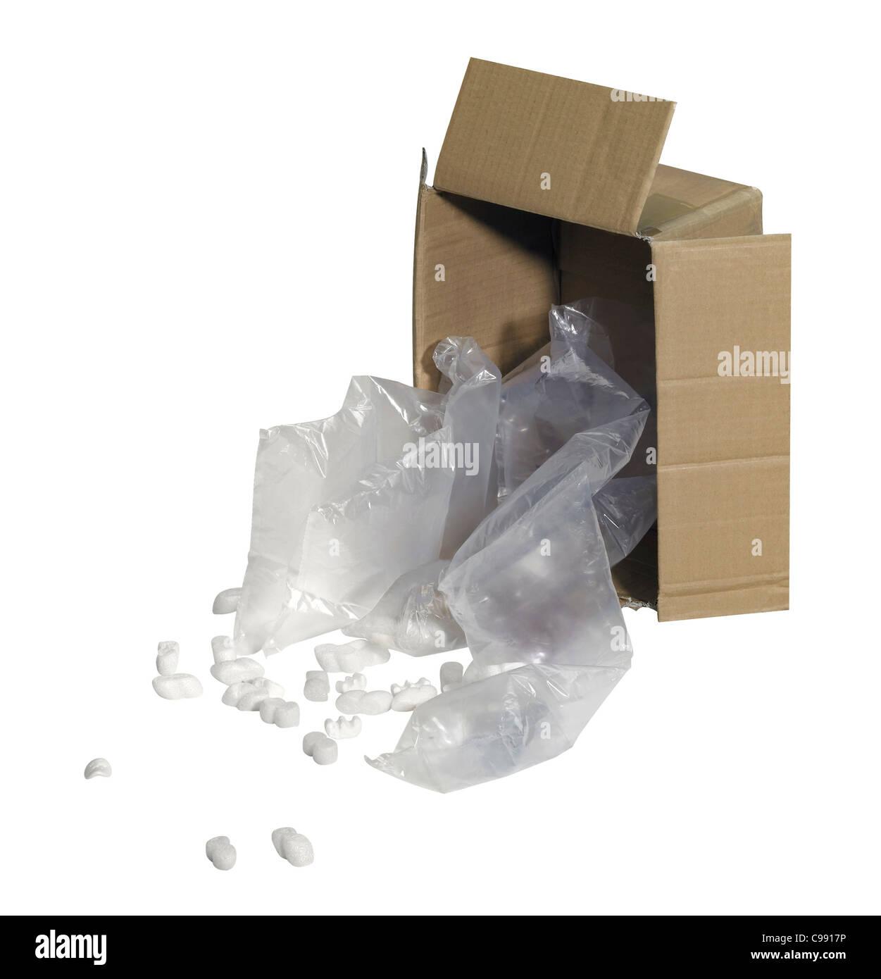 studio photography of a carton and some fallen out filling material ...