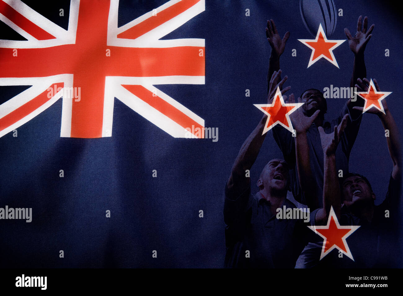 New Zealand flag and rugby players Stock Photo