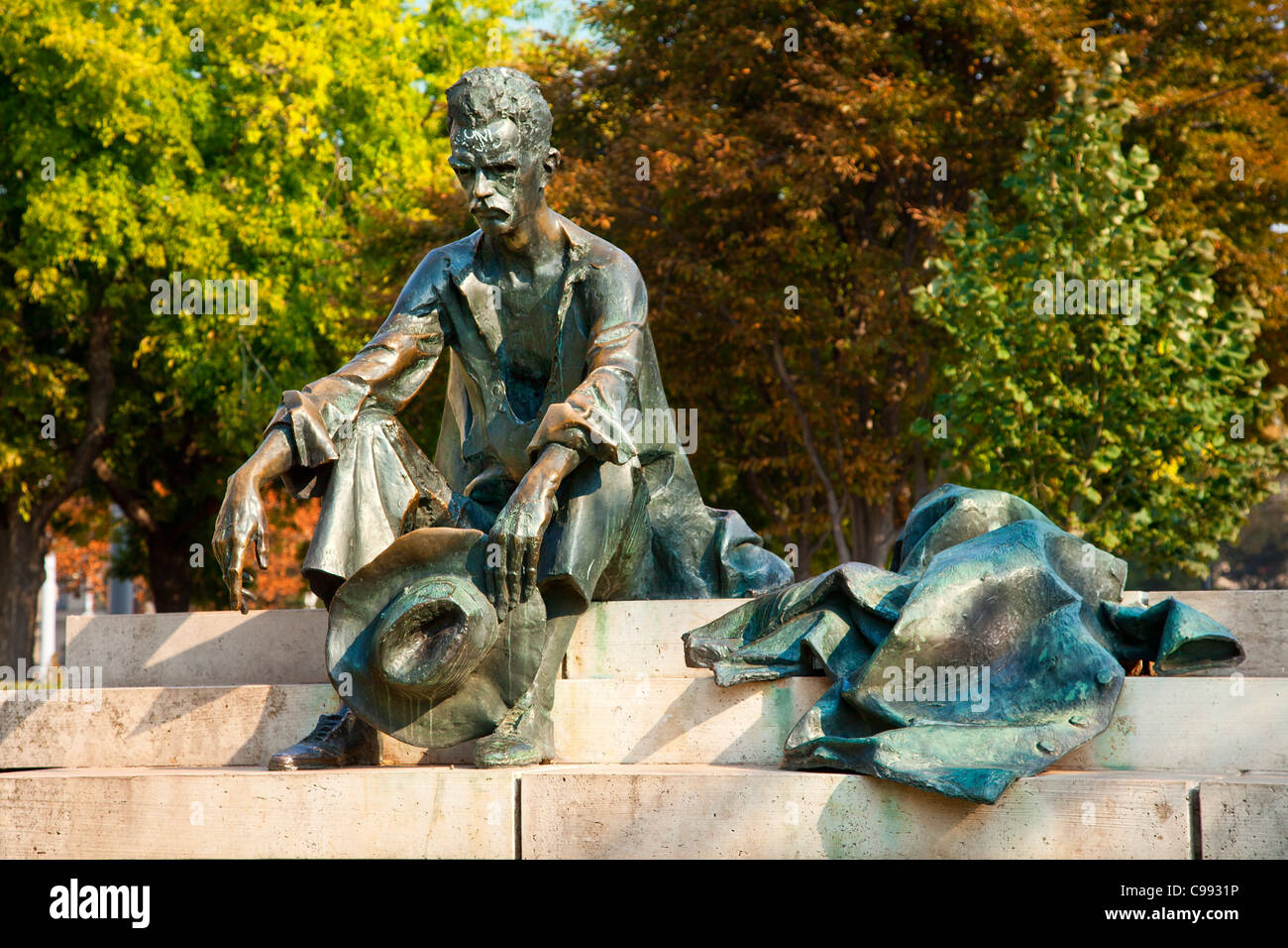 Budapest, Statue of poet Jozsef Attila next to Hungarian Parliament Building in Budapest Stock Photo