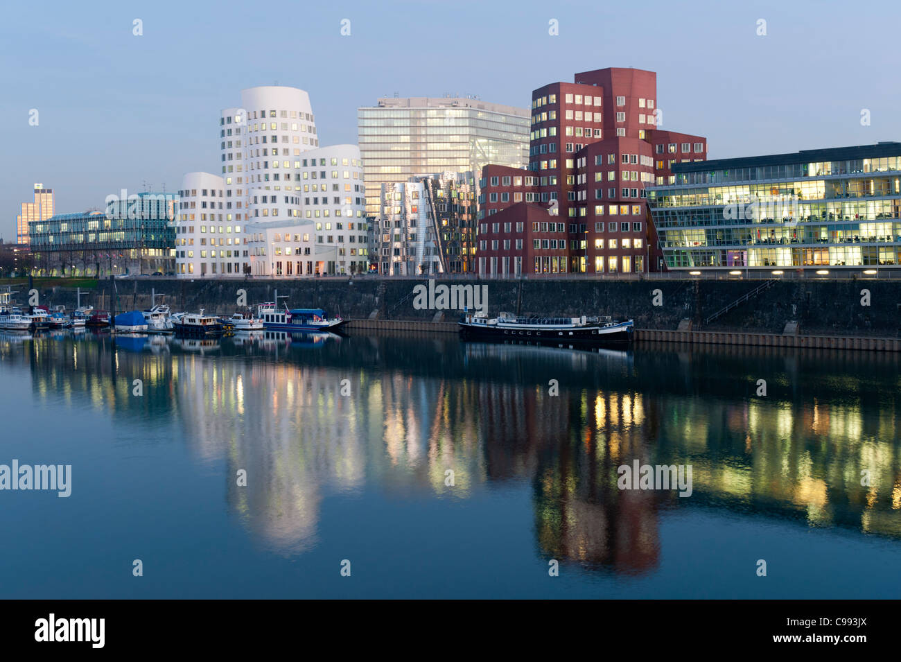 Neuer Zollhof office buildings at night in modern property development