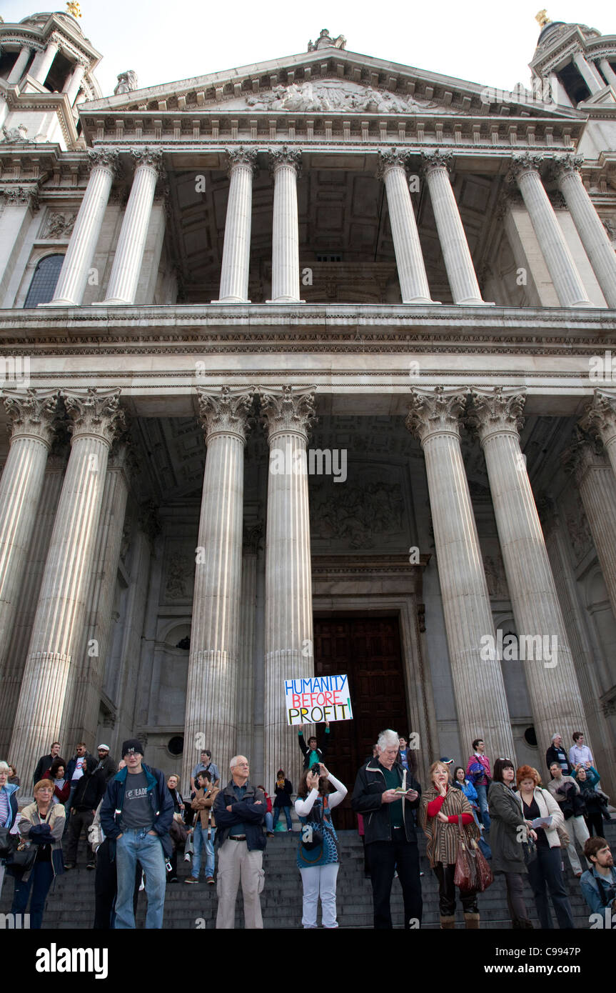 French activist and author Jean-Baptists Redde  with banner in Occupy London camp outside St Paul's Cathedral, London Stock Photo