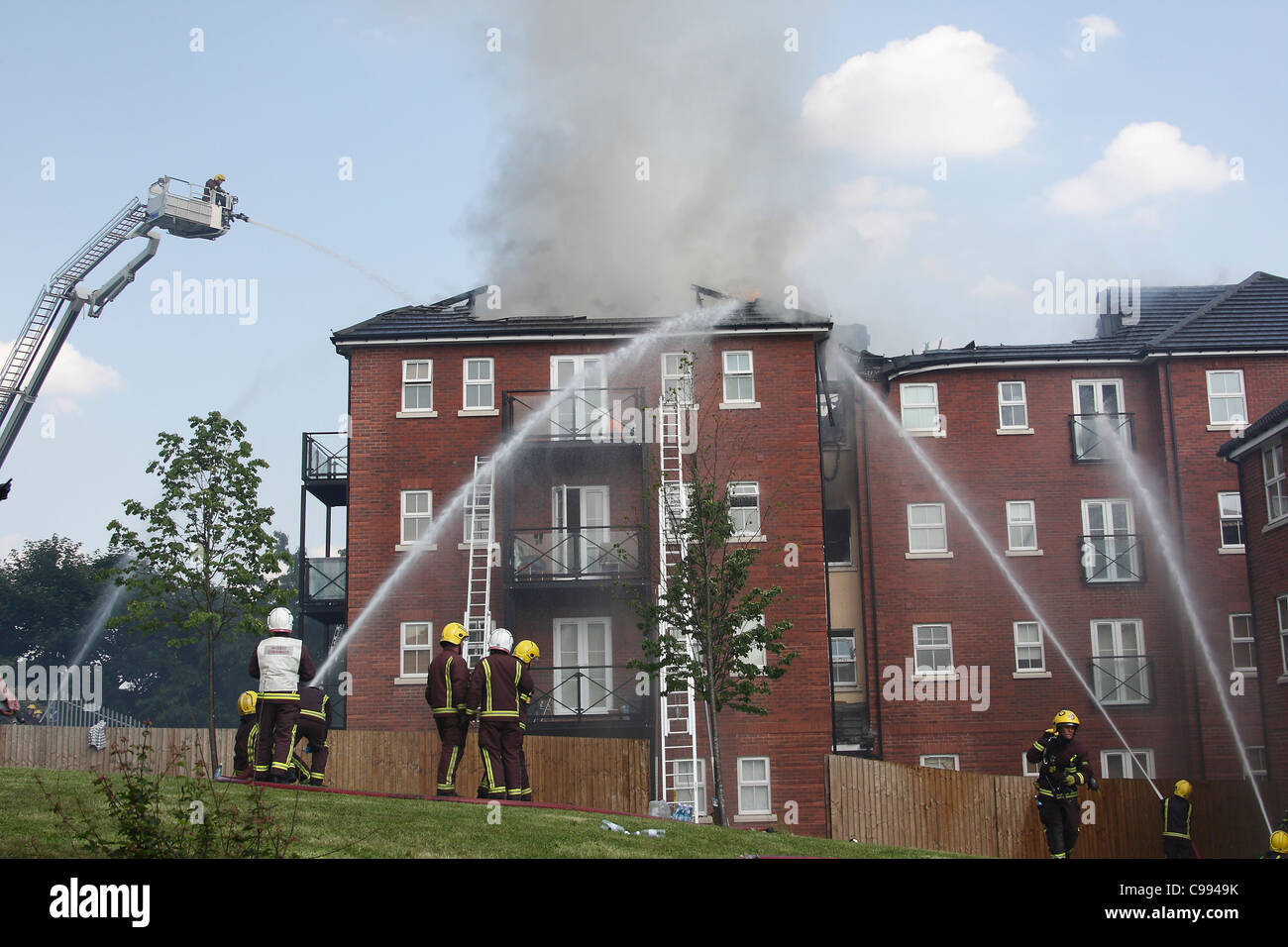 Firefighters tackle a fire in a block of flats in Ilford Stock Photo