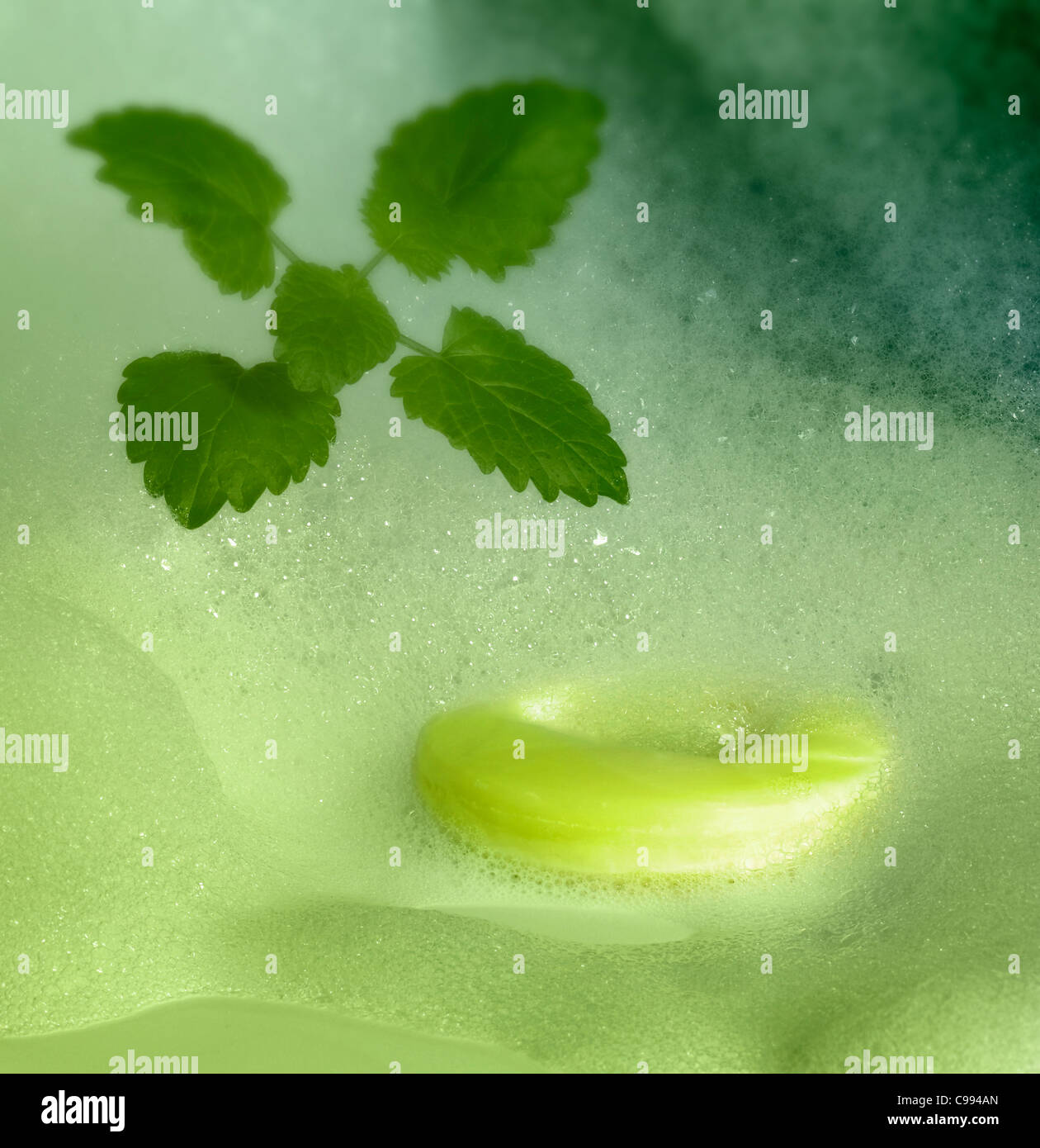 symbolic fresh cleaning background including a piece of bar soap, green