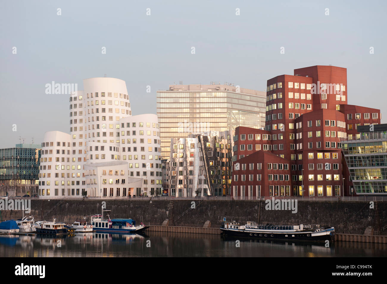 Neuer Zollhof office buildings at night in modern property development