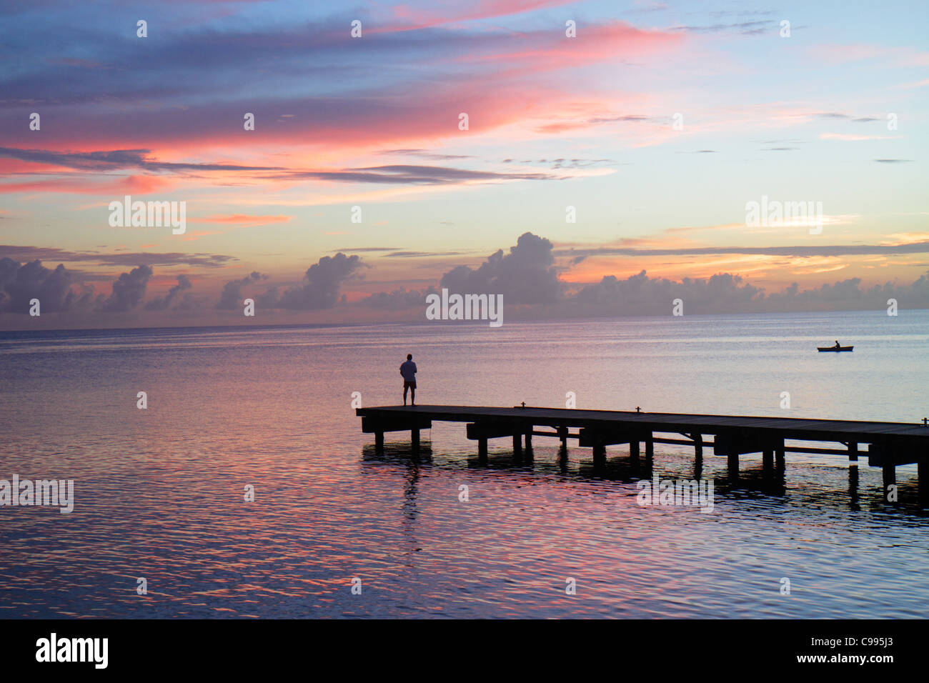 Curaçao,Netherlands Lesser Leeward Antilles,ABC Islands,Dutch,Piscadera Bay,Caribbean Sea,water,pier,man men male adult adults,standing,rowboat,coastl Stock Photo