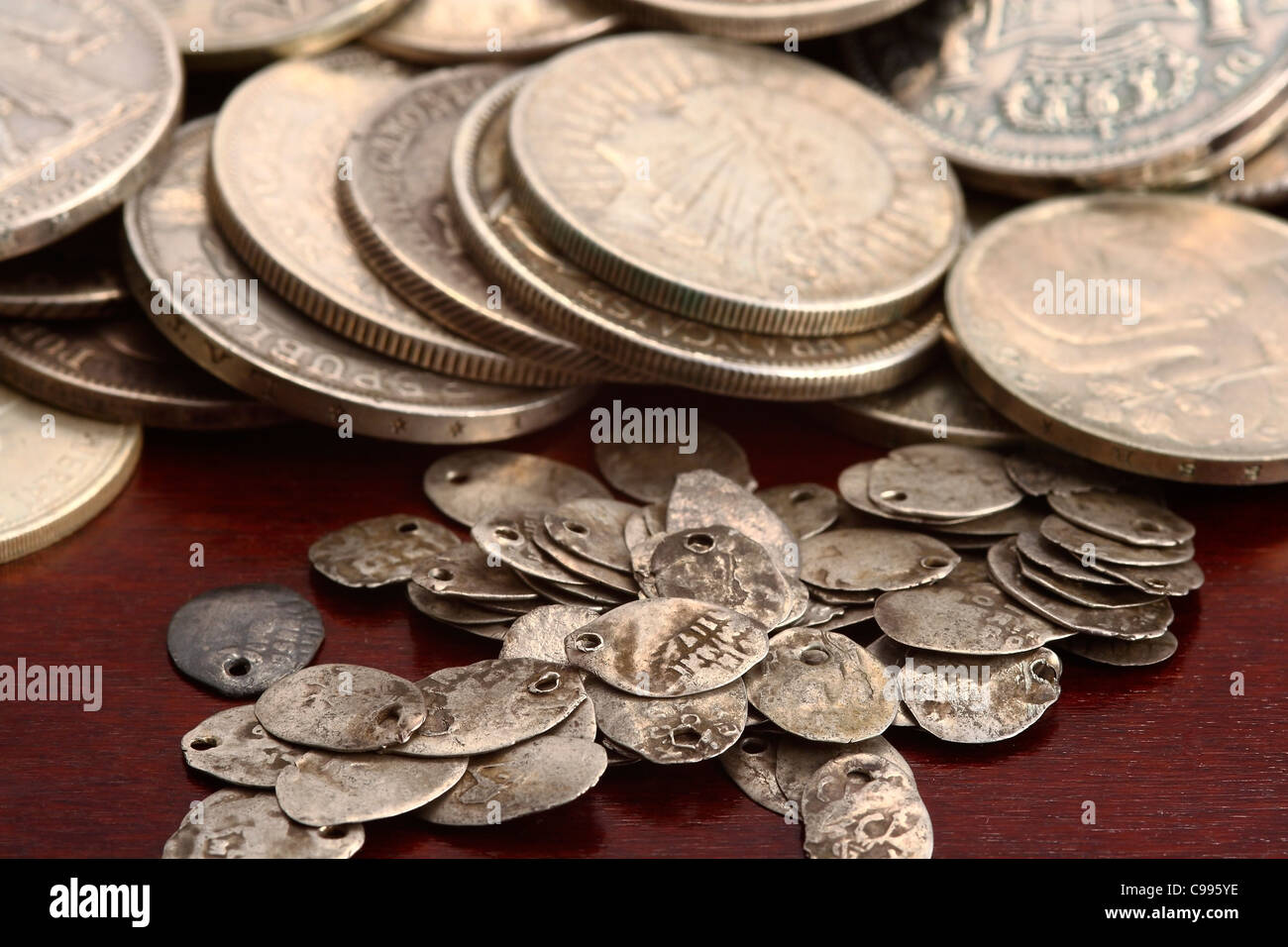 Round silver coins hi-res stock photography and images - Alamy