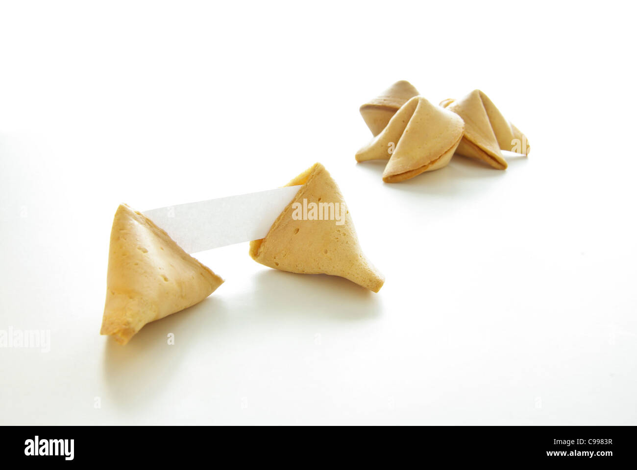 Asian fortune cookies with blank paper isolated on white background
