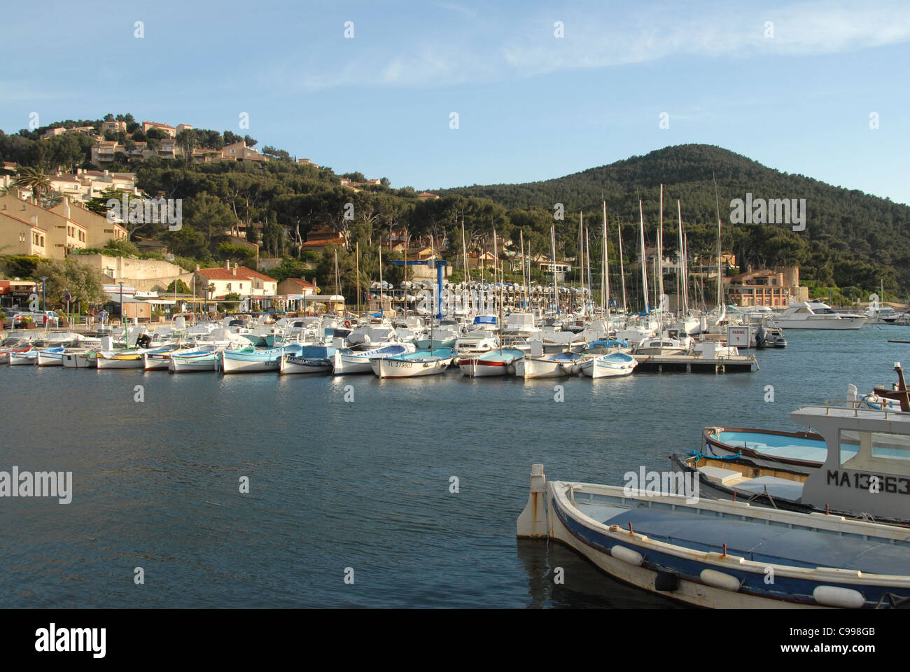 Sail boats and yachts in the port of La Madrague  near Saint-Cyr-sur-Mer in Var, Provence, France in summer Stock Photo