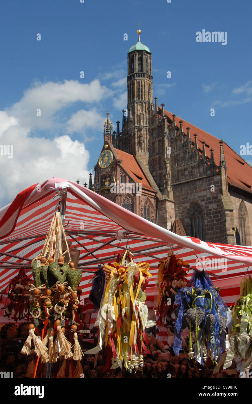 Traditional craft decoration at a market stall on the main market Hauptmarkt at Frauenkirche in Nuremberg, Franconia, Bavaria Stock Photo