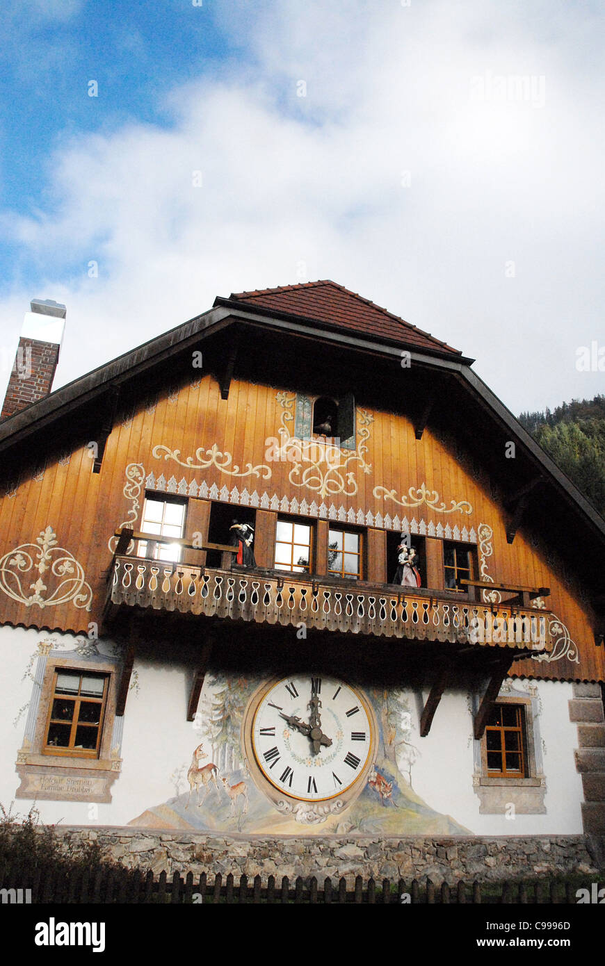 Giant cuckoo's clock on the wall of a traditional Black Forest house at Hofgut Sternen in Breitnau, Höllental, Baden-Württemberg Stock Photo