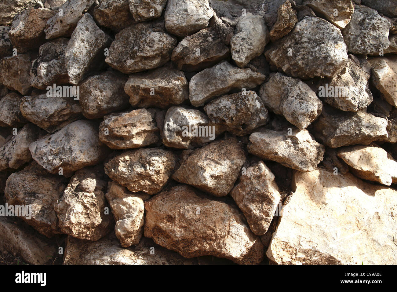 stone background of sand pebbles summer day outside Stock Photo