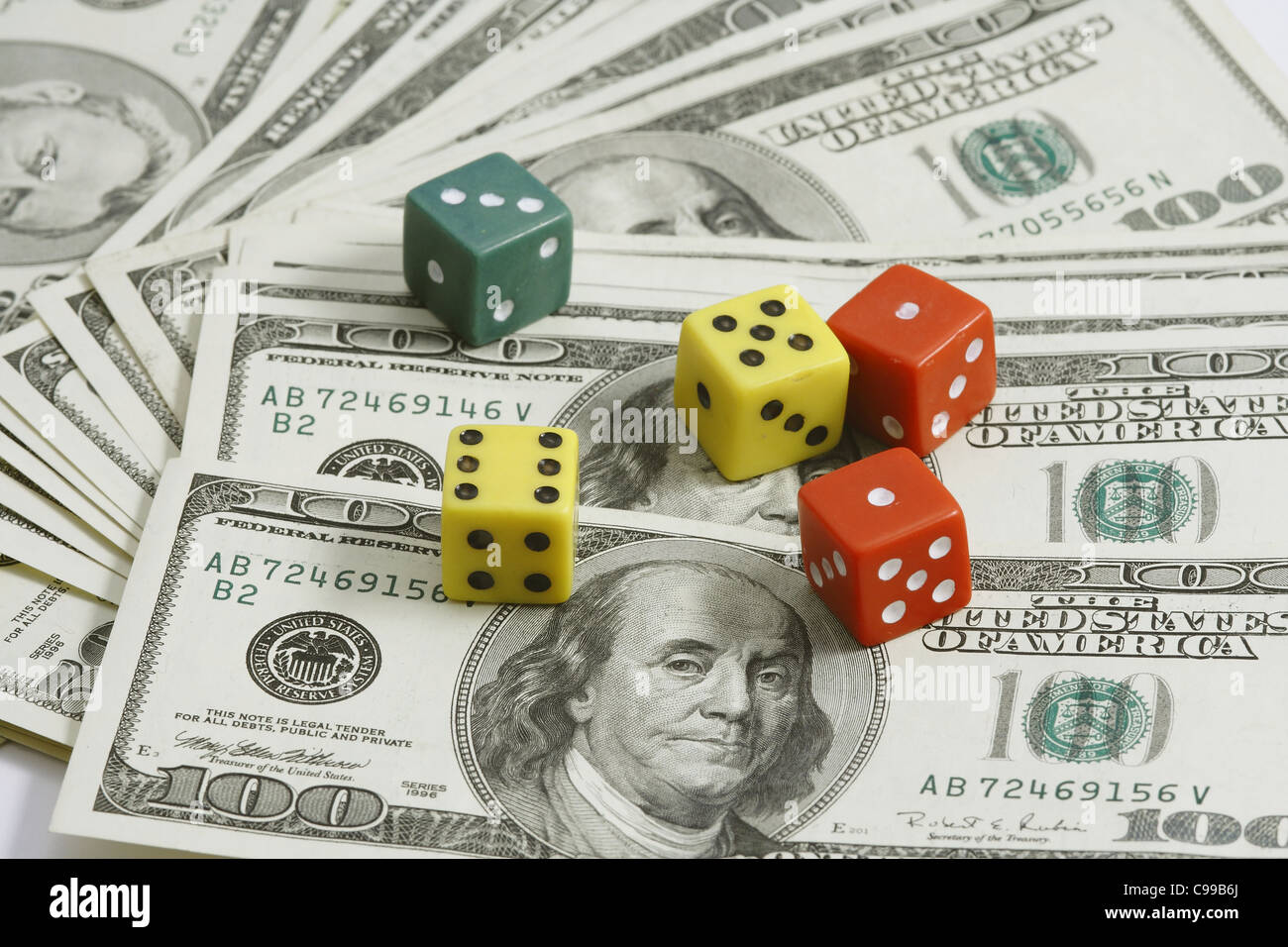 money and dice Stock Photo Alamy