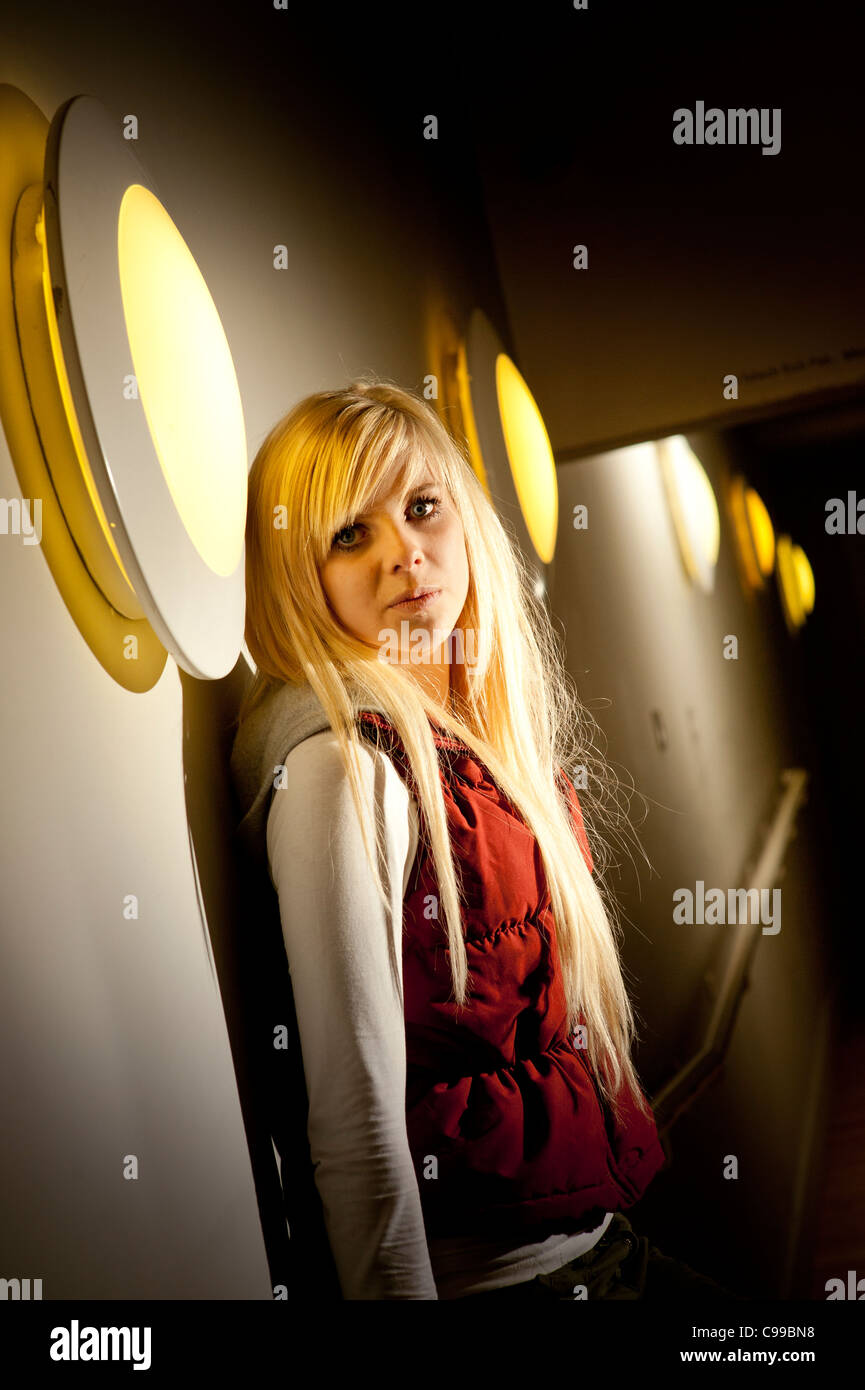 A 16 year old blonde haired slim teenage girl, UK Stock Photo
