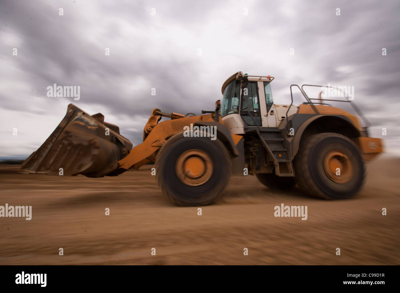 Front loading shovel working in a quarry Stock Photo Alamy