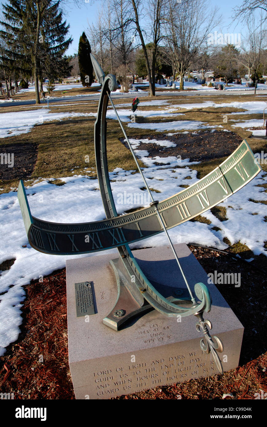 A memorial grave marker in the form of a functional sundial at Mount ...