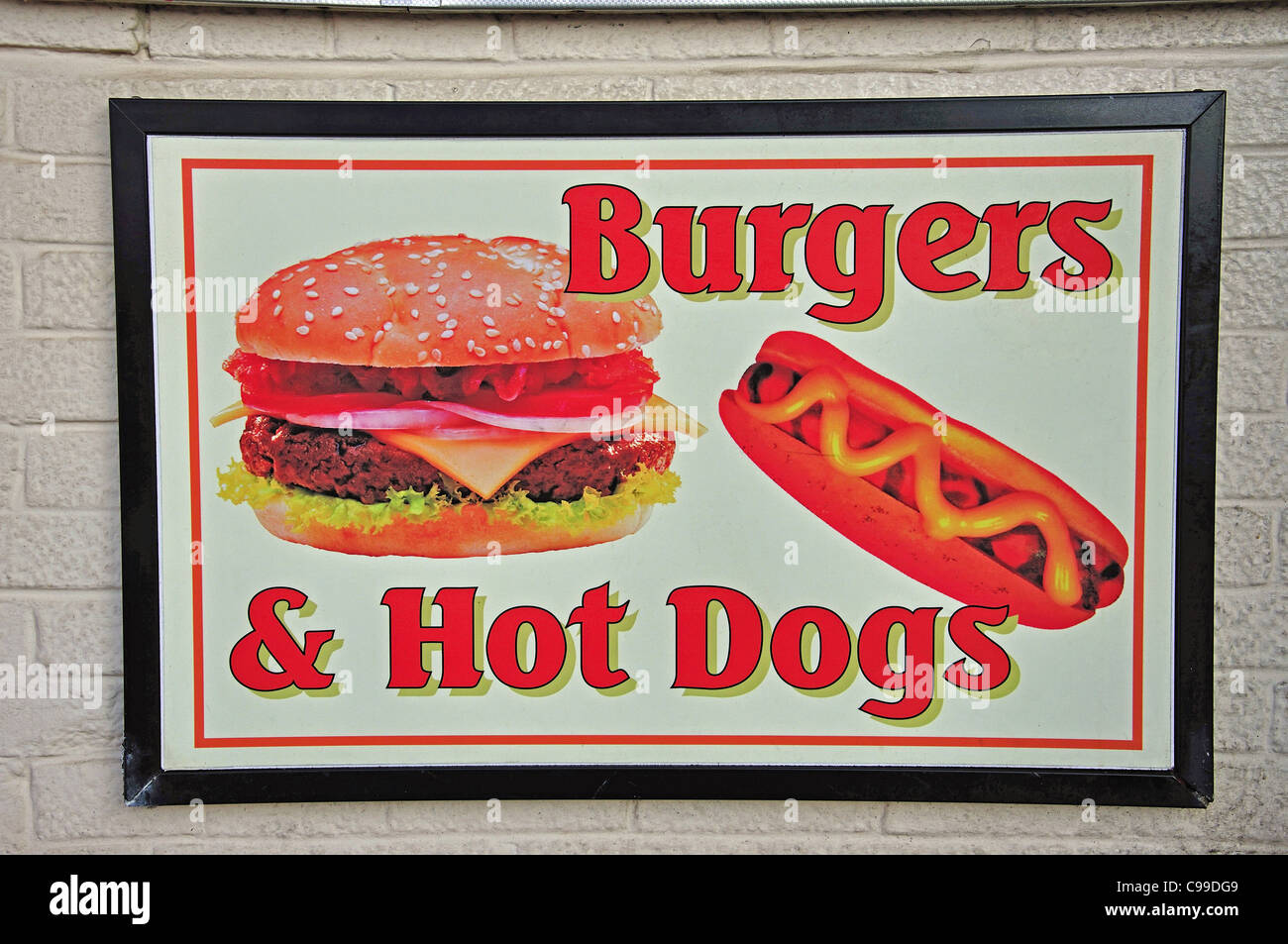 Hot dog and burgers sign outside promenade cafe, Southsea, Portsmouth, Hampshire, England, United Kingdom Stock Photo