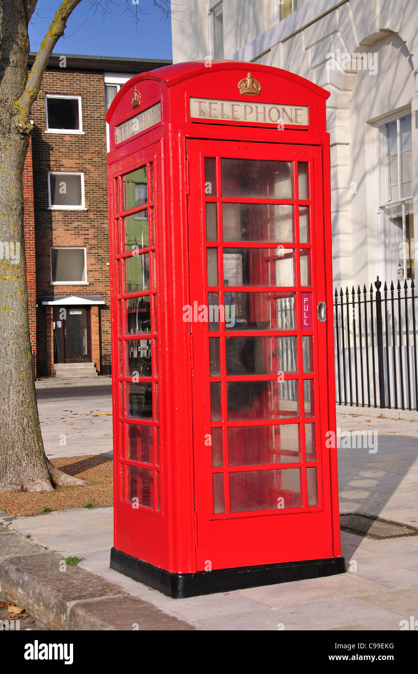 Red telephone box on Grand Parade, Old Portsmouth, Portsmouth, Hampshire, England, United Kingdom Stock Photo