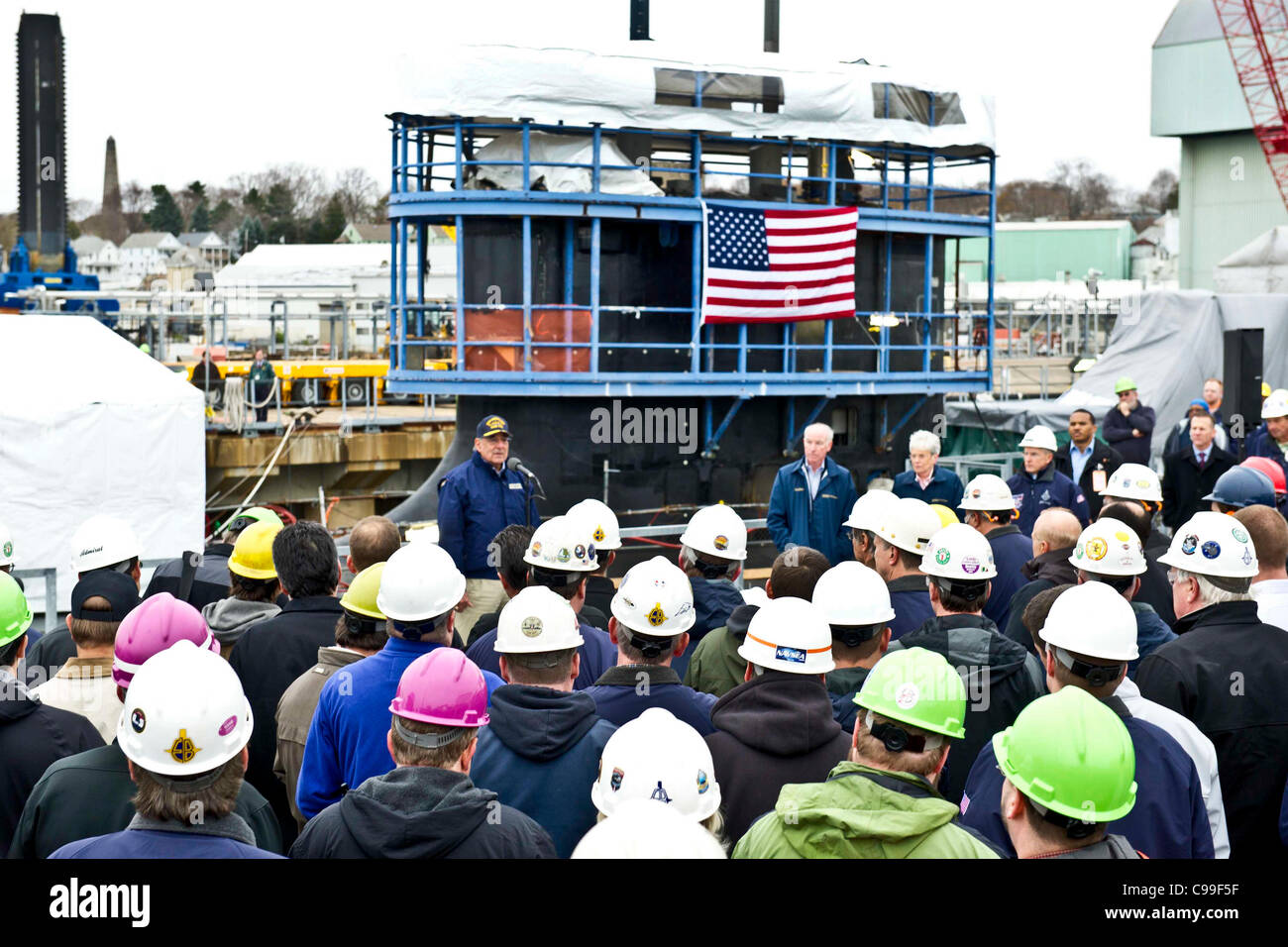 The Secretary of Defense Leon E. Panetta speaks to the crew and workers from General Dynamics Electric Boat in front of the USS Mississippi in Groton, Ct. on November 17, 2011. Secretary Panetta observed the final phase in the building of the Virginia class submarine which will be finished a year ah Stock Photo