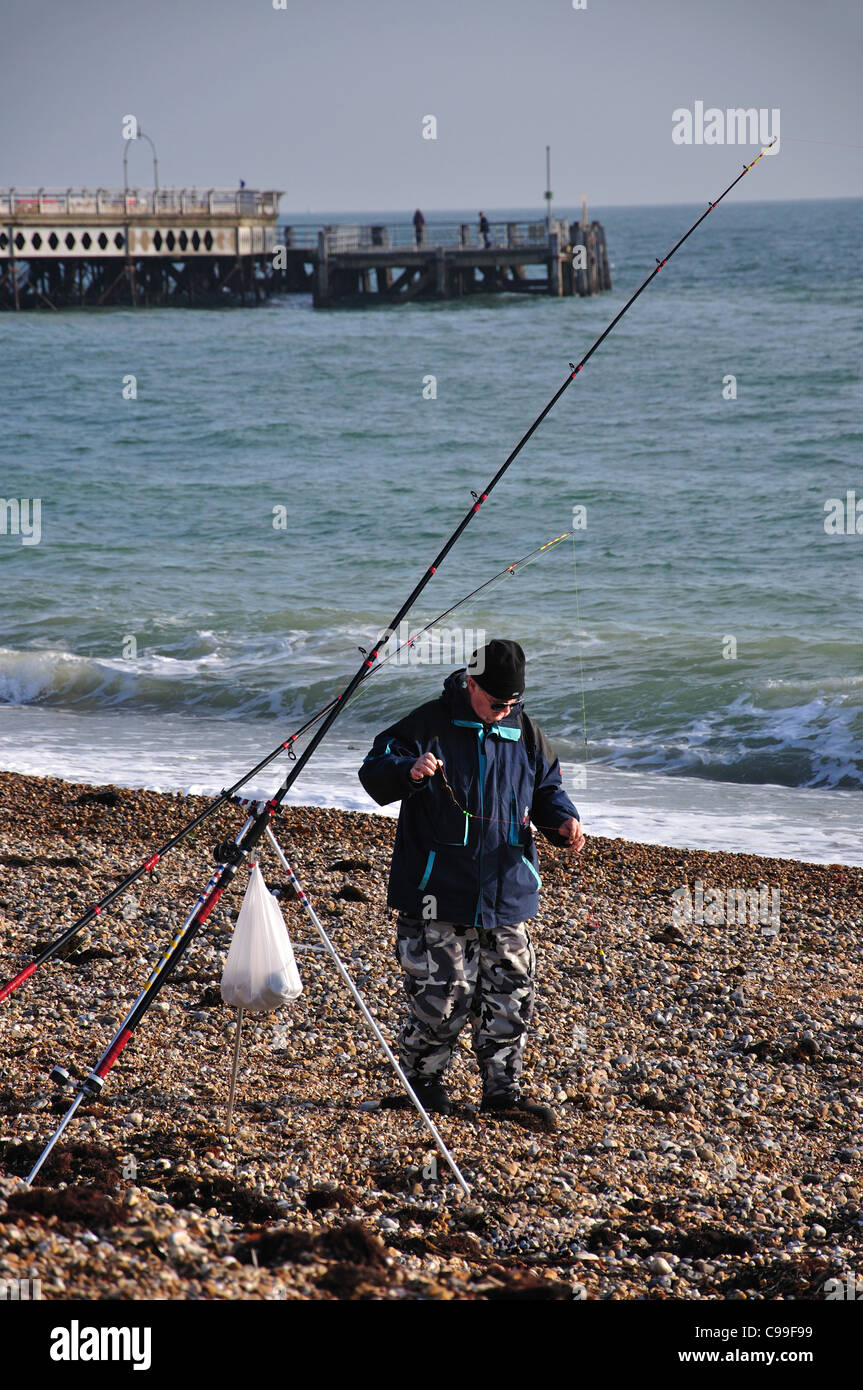 Fishing on beach by South Parade Pier, Southsea, Portsmouth, Hampshire, England, United Kingdom Stock Photo