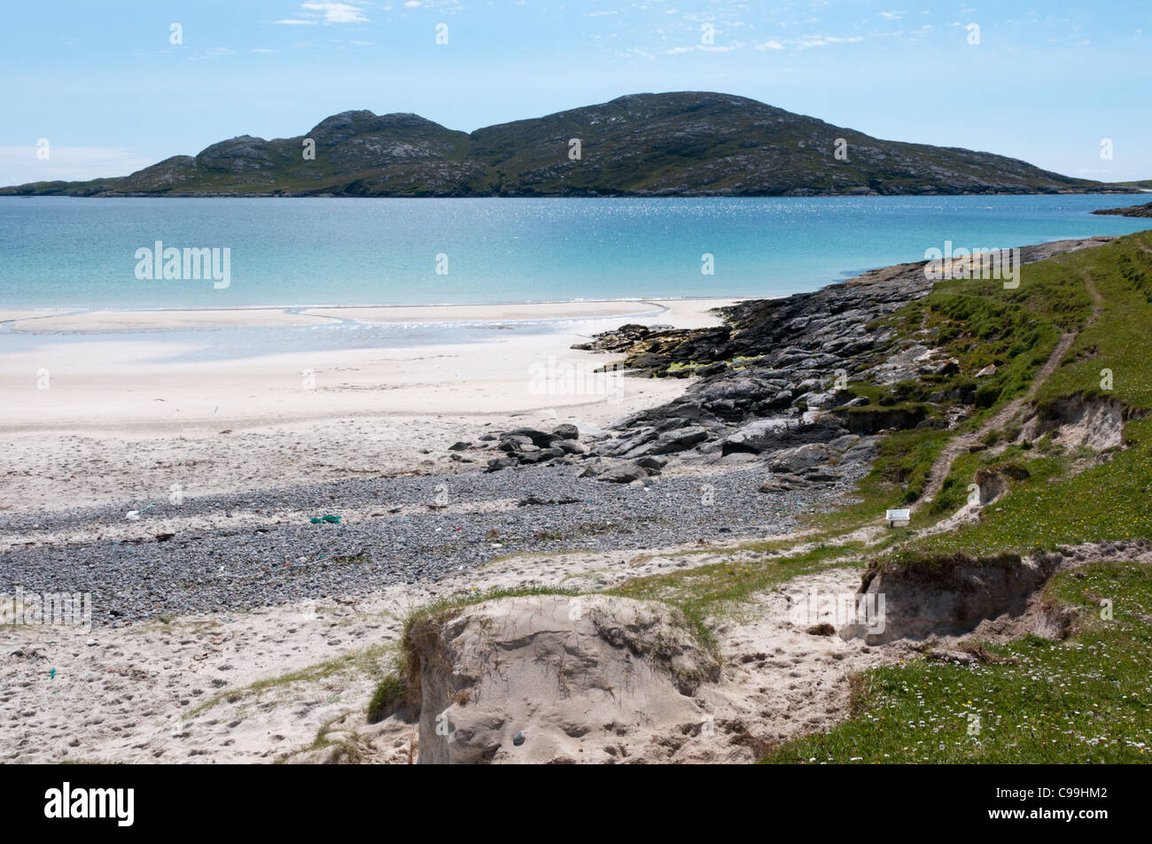 The island of Sandray seen across Sandray Sound from the south of Vatersay in the Outer Hebrides. Stock Photo