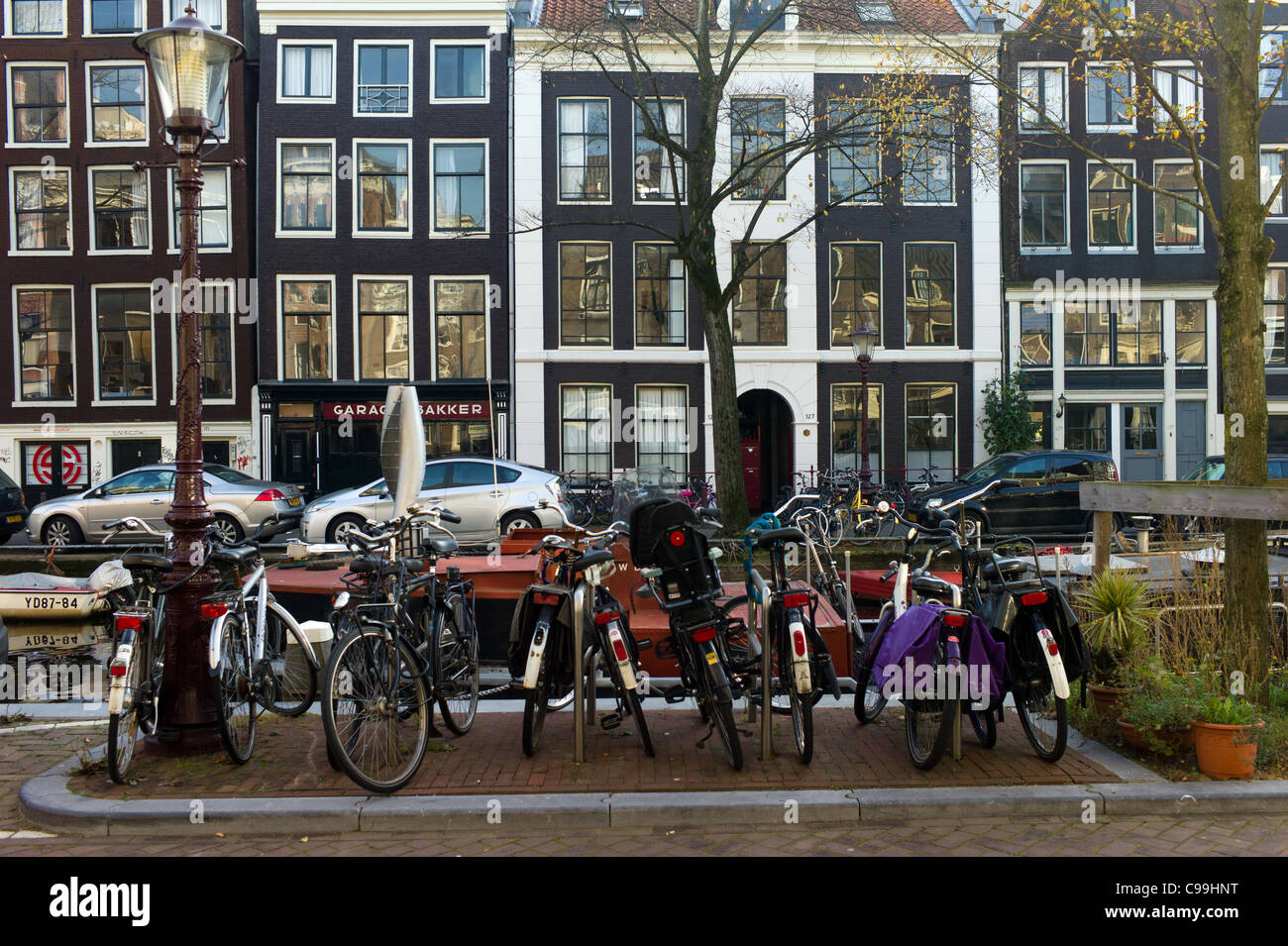 Amsterdam street scene with parked bikes Stock Photo Alamy