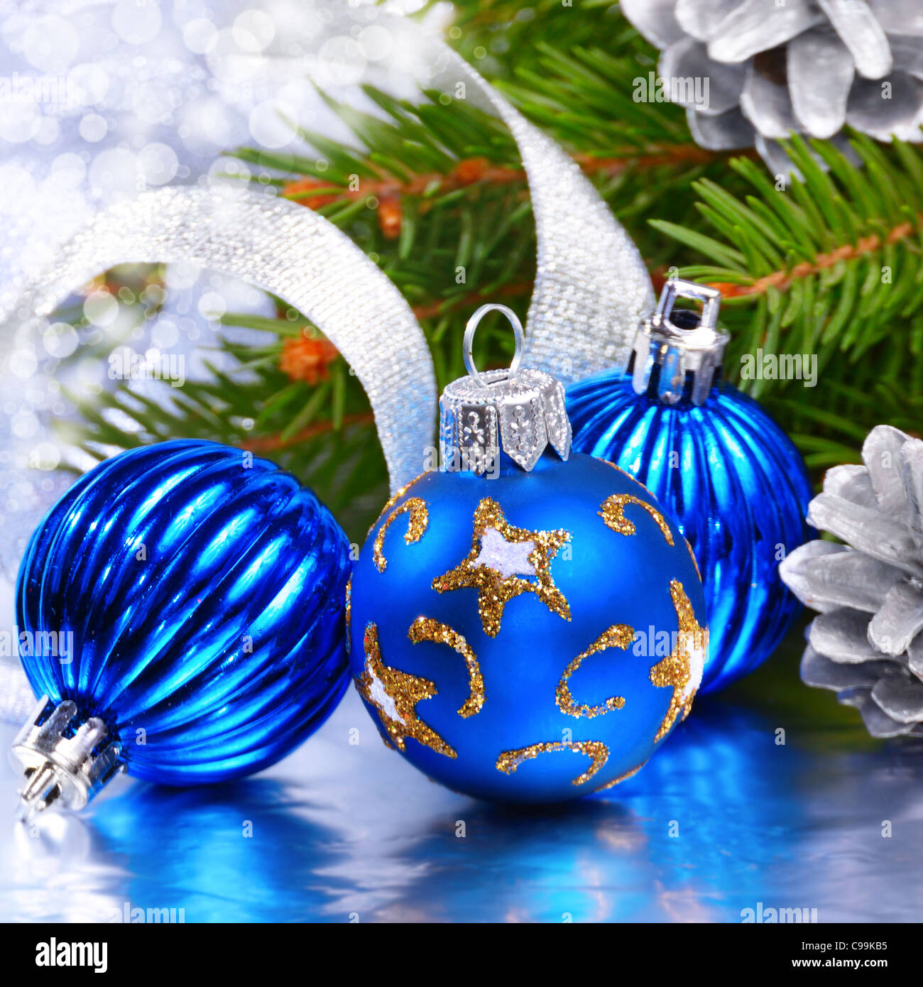 Blue and silver Christmas balls over bright background Stock Photo - Alamy