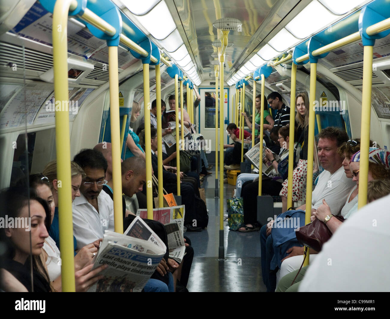 Commuters on London Underground Train, London, UK Stock Photo