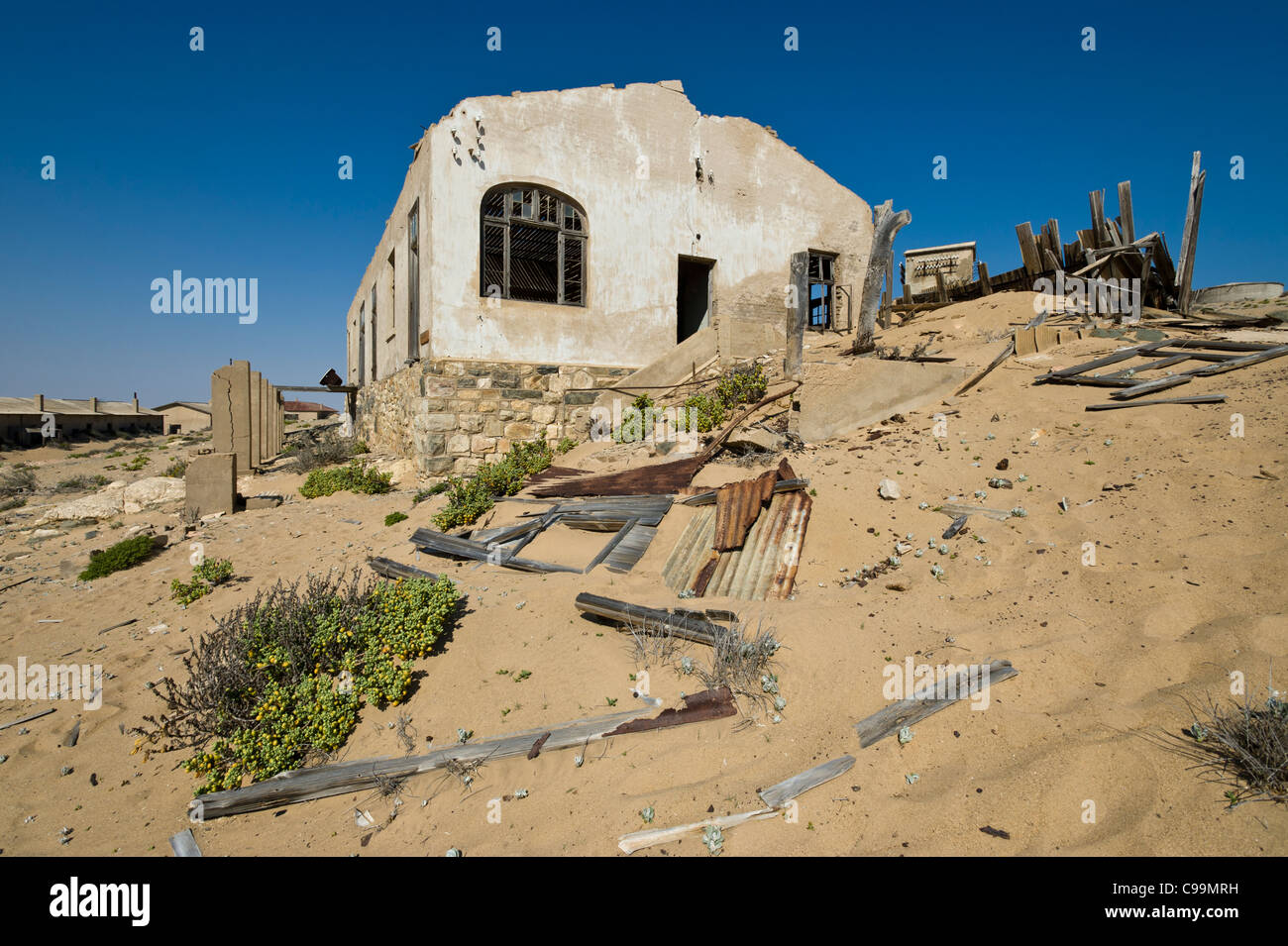 Abandoned house in Kolmanskop a former diamond mine in Namibia Stock Photo