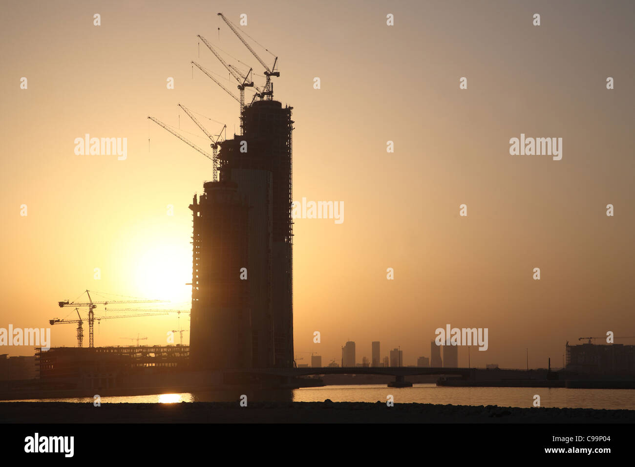 Financial Harbour Development, Bahrain under construction. Sunset. Stock Photo