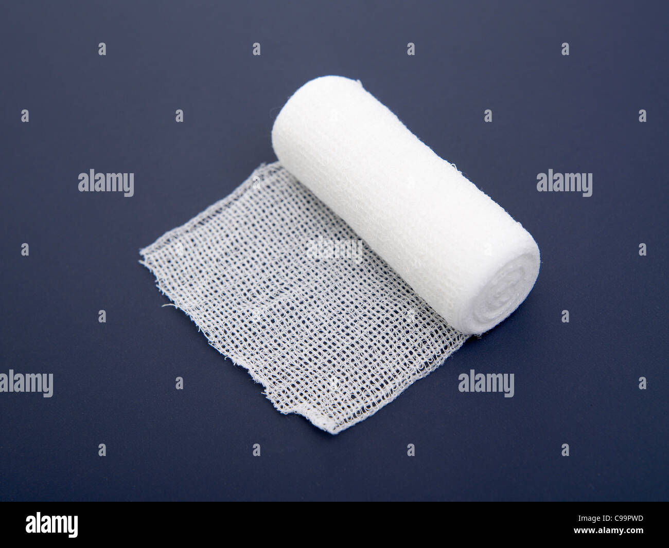 Gauze bandage on blue background Stock Photo