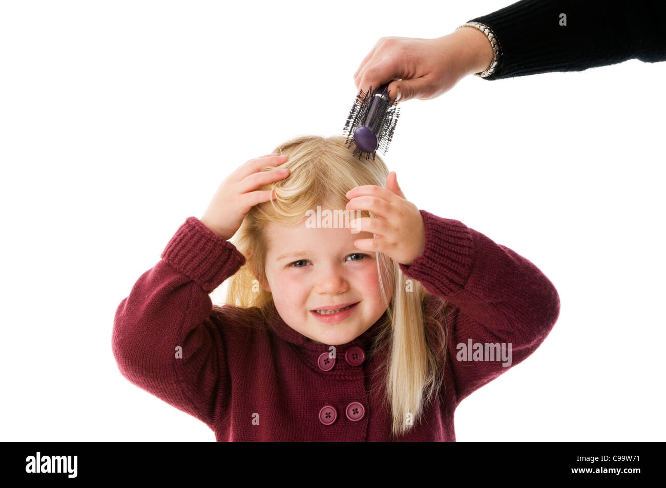 hair brush hairbrush girl having her brushed long blond tangle tangled