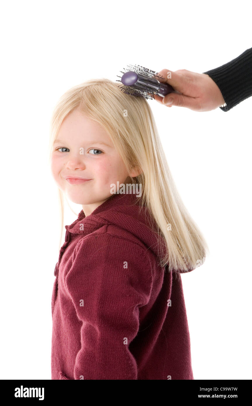 hair brush hairbrush girl having her brushed long blond tangle tangled