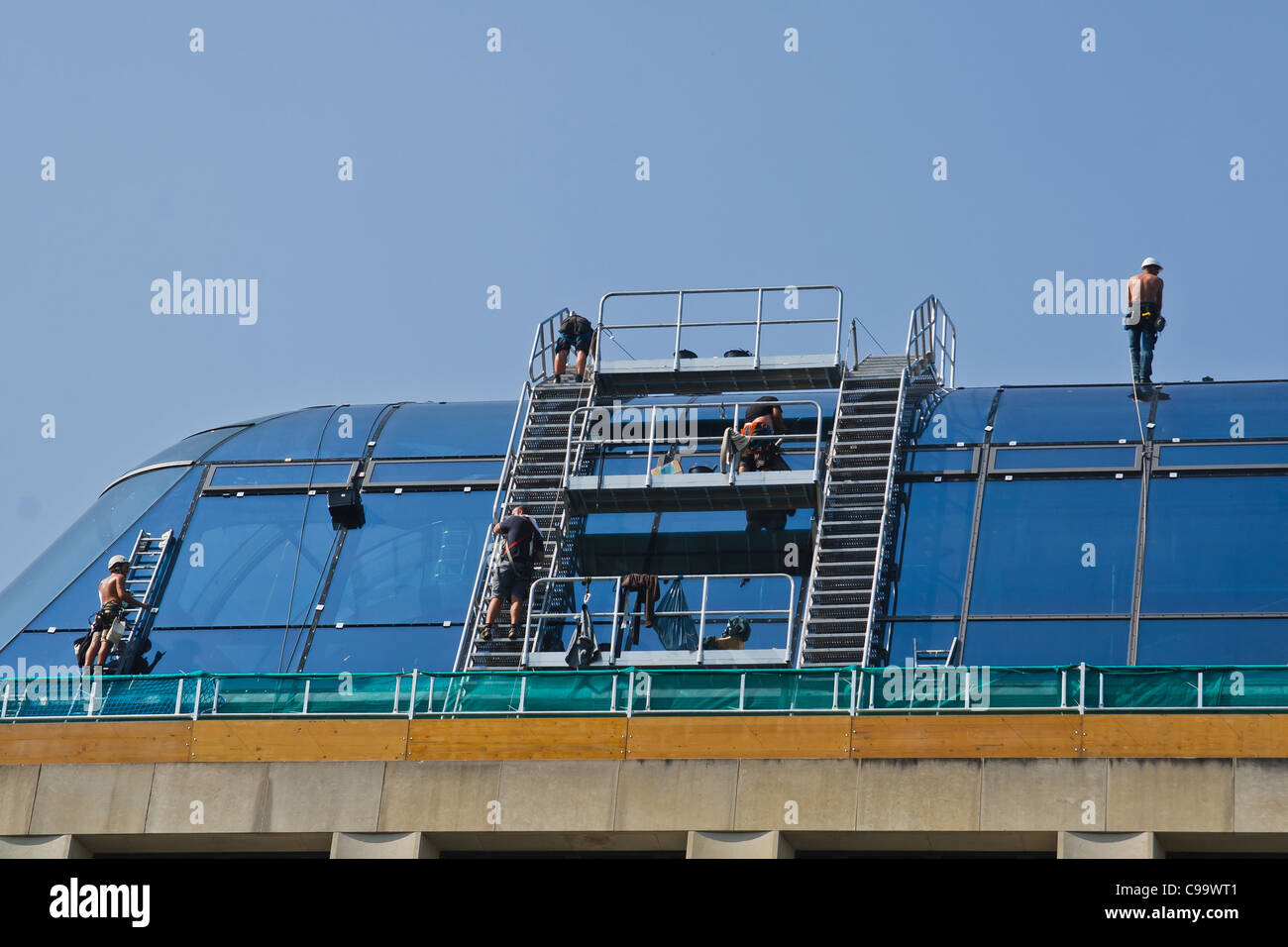 Work on a glass roof of Radisson Hotel. Berlin, Mitte, Germany. Stock Photo