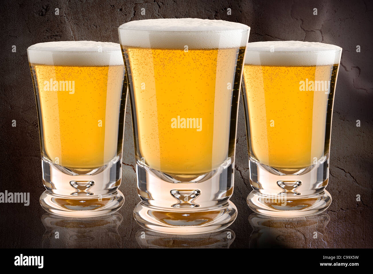 three 3 continental glasses of beer Stock Photo